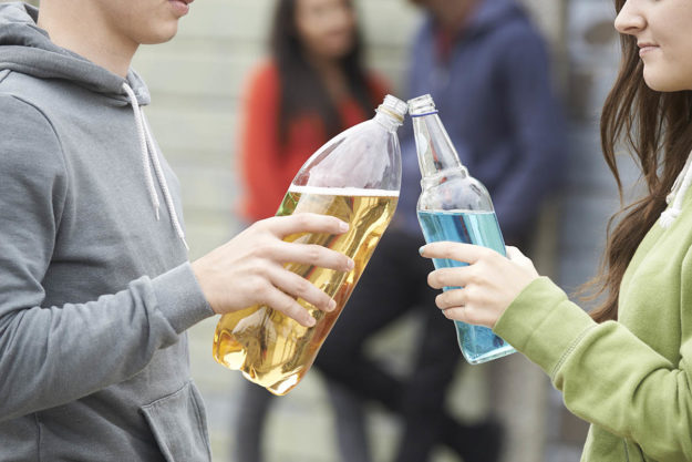Teenagers drinking alcohol